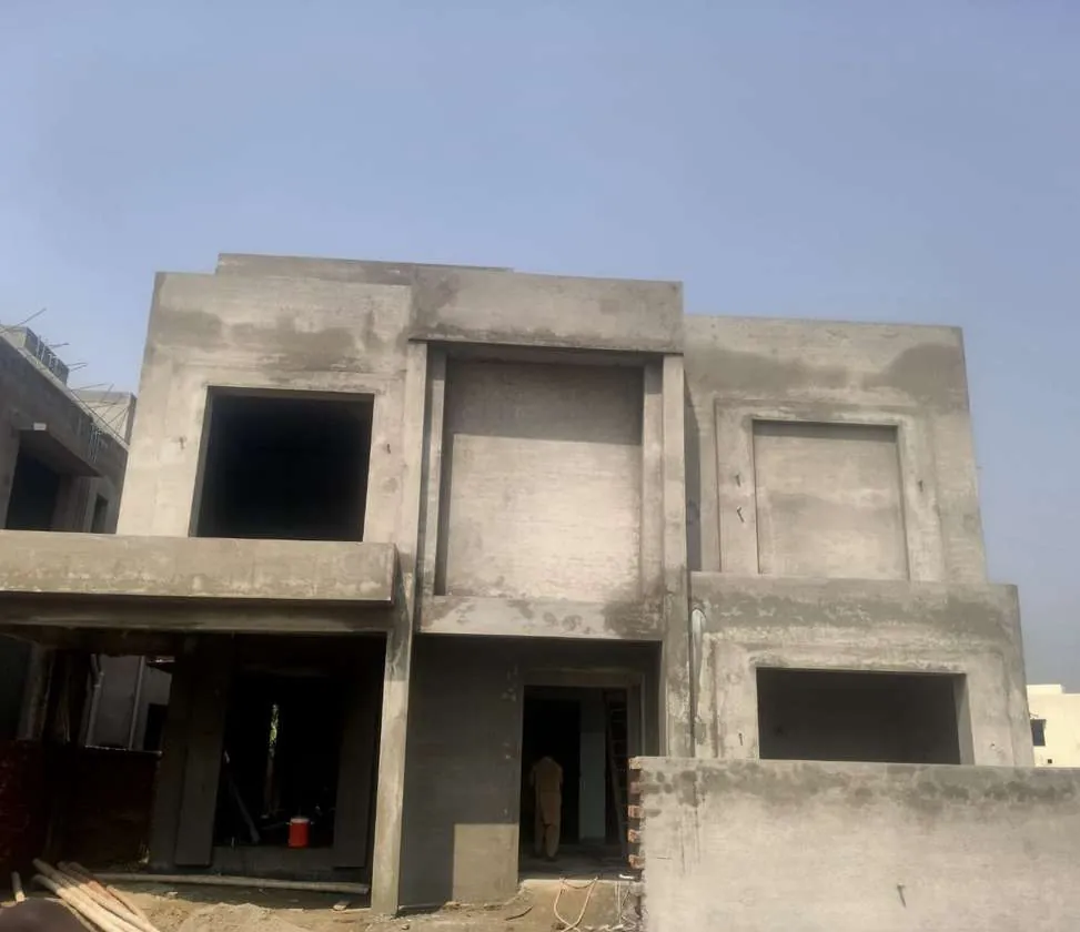 House at grey structure stage in DHA Phase 8, Lahore