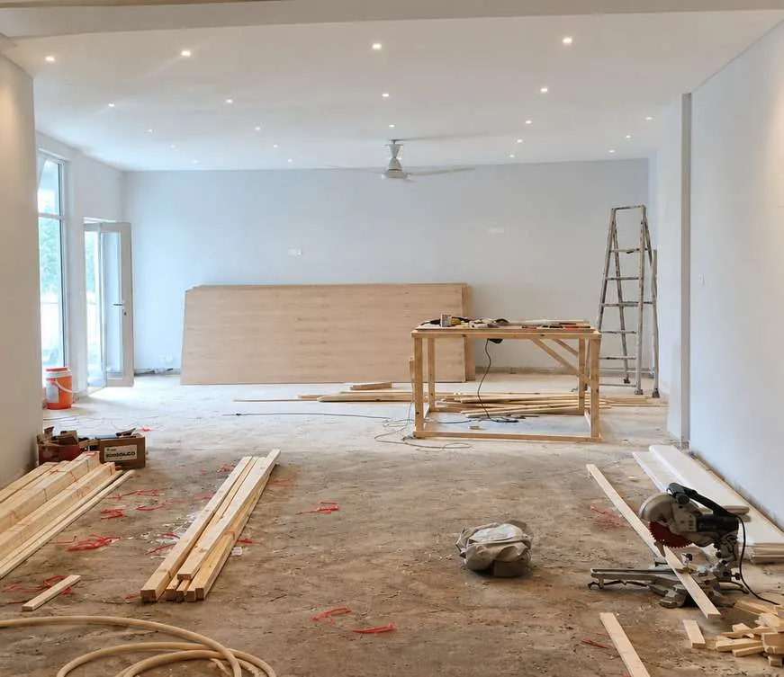 Interior works in progress with timber and tools in Upper Mall, Lahore